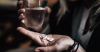 photo of a person taking anxiety medication