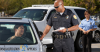 a cop giving someone a ticket